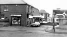 View: t06853 Meadowhead showing Vantage chemist (left) and The Norton Hotel (back)