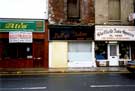 View: t07209 Nos. 623, derelict Ali's Tandoori Takeaway; 625, Betty's Salon, ladies hairdressers; and 627, Sheffield Auto Spares, motor accessories