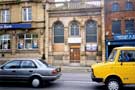 View: t07212 Nos. 566/68, Hartley and Son Ltd., printers; 570, former Sheffield Trustee Saving Bank and 580, Yorkshire Bank, Attercliffe Road at the junction of Staniforth Road