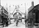 View: t07785 Decorative arch at the junction of Broad Street and South Street, Park during the visit of Queen Victoria 21st May 1897.