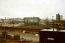 View: t07849 Canal Basin showing Straddle Warehouse (centre) and railway arches (right)