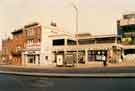 View: t07996 Waingate showing (left to right) The Boulogne public house (formerly the Tap and Barrel public house, Bull and Mouth PH and Tap and Spile PH), Chadburns Opticians, Parker Franks, discount store and entrance to Castle Market 