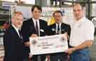 View: t09001 Special Olympics, sponsorship and cheque presentation by Lions Club International to swimmer (first right) Adrian Moorhouse