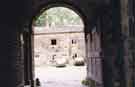 View: t09095 Main archway into the former stables block, Norton Hall, Norton Church Road