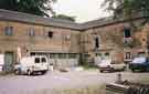 View: t09097 Courtyard of the former stables block showing (left) main archway, Norton Hall, Norton Church Road