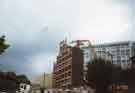 View: t09351 Demolition of flats on Bernard Street showing (right) Harold Lambert Court (formerly Hyde Park Flats)