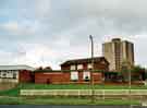 View: t09469 View from Dyche Lane showing (left) Jordanthorpe Library, (centre) the Jordanthorpe public house, and (back) tower block on Jordanthorpe / Batemoor housing estate