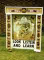 View: t09484 Greenhill Guides well dressing entitled 'Look, listen and learn', outside St. Peter's C of E Church, Reney Avenue,