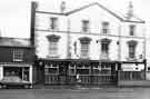 View: t09636 Mail Coach public house, Nos. 149-151 West Street showing (left) No.147 C. J. Parker, pet stores and (right) West Street Photocentre 