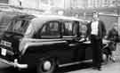 View: t09684 Taxi driver on taxi rank, Fitzalan Square