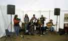 View: t09706 South Riding Folk Network. Folk singing in marquee at Wortley Hall