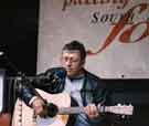 View: t09721 South Riding Folk Network. Tony Capstick performing at the reopening of Abbeydale Industrial Hamlet