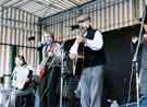 View: t09722 South Riding Folk Network. Bourgeoise Zoo performing at the reopening of Abbeydale Industrial Hamlet