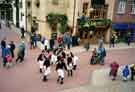 View: t09724 South Riding Folk Network. Handsworth Sword Dancers performing at Orchard Square shopping centre showing (top centre) the Hogs Head public house (previously known as Museum Hotel, Orchard public house and Brewing Trough)