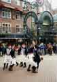 View: t09725 South Riding Folk Network. Handsworth Sword Dancers performing at Orchard Square shopping centre showing (top centre) the craft shops on the first level