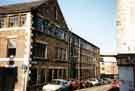 View: t09832 Derelict premises (left) of Frank Cobb and Co. Ltd., silversmiths, Howard Works, Nos. 57-67 Broad Street at junction with Blast Lane