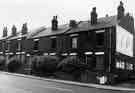 Derelict housing in unidentified street