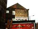 View: t10486 Advertising hoardings on the gable end of the Riverside Court Hotel, Nos. 4 - 12 Nursery Street at the junction with The Wicker