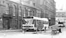 View: t11107 South Yorkshire Transport coach on Pond Hill showing (back) Housing Department offices