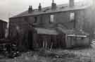 View: t11242 Back yard toilets in the rear of houses on Langsett Road