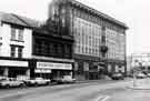 View: t11253 West Bar showing (l. to r.) No.130 Key Finance, financial brokers, No. 126 International Aquatics Centre, tropical fish suppliers and former 'The Hostel', also known as Tudor House, occupied by P. W. Lacey Ltd., No 120, West Bar