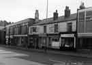 View: t11267 Shops on Attercliffe Road showing (l. to r.) No. 738 Curry's Ltd., radio and television dealers, Nos.734-736 Attercliffe Branch Post Office, No.732 Station Hotel, No.730 Hargeisa cafe, No. 728 H. Hewitt, hairdressers and No. 726 G. Myers, butcher