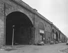 View: u08504 Victoria Station Railway Viaduct, Sussex Street showing premises of R W Lawson and Co. Ltd, wholesale hardware dealers