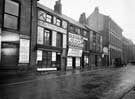 View: u08700 Nos. 87 to 93 Norfolk Street showing No 87, Ye Olde Original Snuff Shoppe, Louis Stonefield, jewellers, Hay and Son, wine merchants