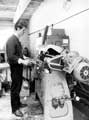 Brian Slack using a Laycock's polishing machine at A. Davies and Co. (Cutlers) Ltd., No. 27 Leadmill Road