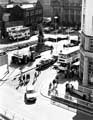 View: u09279 Fitzalan Square, showing taxi rank and statue of Edward VII, with No. 11 Wigfalls, electrical store in the background.