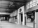 View: u10077 Interior entrance to Castle Hill Market from Waingate showing the stall of L.R. Watts