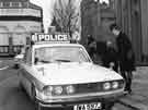 View: u10482 Police cars on St.James Row looking towards, St. James' Street and Eadon, Lockwood and Riddle (No 2), chartered auctioneers  