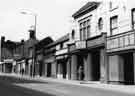 View: u10510 Shops and businesses on Attercliffe Road awaiting demolition showing Walkers Shoe shop (No,675)