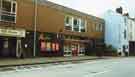 View: u10920 Division Street showing (left) the Age Concern Centre, (centre) Voluntary Action Sheffield (right)  No.71 Green and Benz, jewellers