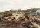 View: u10982 Construction of Park Square Supertram bridge on Commercial Street showing (left) Hyde Park Flats and (right) Park Hill flats 