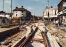 View: u10985 Construction of Supertram track at junction of (foreground) Langsett Road and (left) Holme Lane showing (left) Bags of Choice and Superfruit