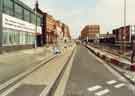 View: u10987 Construction of Supertram track on West Street showing (l.to r.) Division of Continuing Education, University of Sheffield and No.182 The Hallamshire Hotel