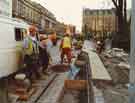 View: u10992 Construction of Supertram stop on Church Street showing (left) the Cutlers Hall