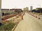 View: u11001 Construction of Supertram on east side of Netherthorpe Road looking south showing (top centre) Netherthorpe flats and the Arts Tower, University of Sheffield and (centre left) Albert Marsh and Co. Ltd., engineers