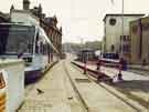 View: u11004 Construction of Supertram stop on Commercial Street showing (top right) Barclays Bank and (centre) Park Square Supertram bridge