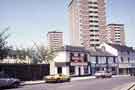 View: w02396 London Road showing (centre) Central Upholstery and Wheels and (back) Lansdowne Flats