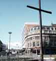 View: w02580 Easter cross in Fargate at junction with Leopold Street showing (back) Wilson Peck Ltd., music warehouse, Nos. 66-70 Leopold Street