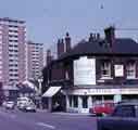 View: w02618 London Road showing (left) Lansdowne Flats and (right) Eric and Nellie Hadfield, ladies hairdressers (No.143)