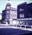 View: w02772 Moorhead showing (l.to r.) P.W. Lacey Ltd., footwear and outfitters, Newton Chambers and (No.5) W.H.Curtis, radio and television dealer