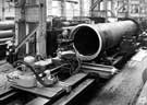 Firth Brown Ltd. profile turning a 1,000 m/m mould, 23 foot 8 inch long, 41 foot 5 inch bore