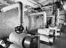 View: y05548 Glossop Road Baths - boiler house showing hot water storage tank and three 126KW Santon flow heaters