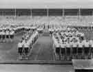 View: y11178 Visit of Queen Elizabeth and HRH the Duke of Edinburgh to Hillsborough football ground to see the children's display during their visit of 27th October 1954.