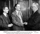 View: y11431 Jessop Saville Ltd. Mr Bailes presents 25 year medals to Harry Duncan and Fred Swift, 1960.