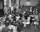 View: y11754 School meals; children taking dinner in a school hall