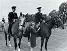 View: y13636 Sheffield and Rotherham Constabulary: Mrs Barbara Matthewman presents the 'Steelphalt Trophy' to members of the Sheffield and Rotherham Constabulary team at the Sheffield Show